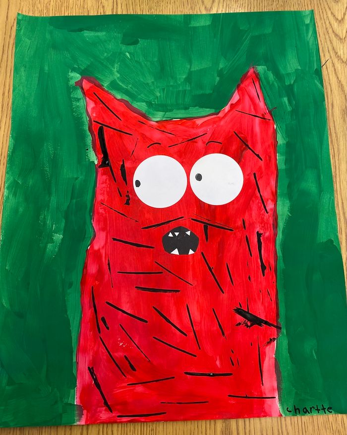 A young artist's portrait of a friendly monster looking off to the side with its mouth opened in an oval. The monster is bright red on a green background.