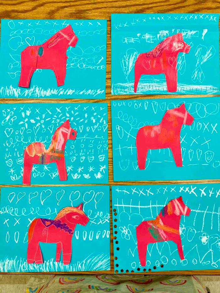 A collection of illustrated Sweedish dala horses